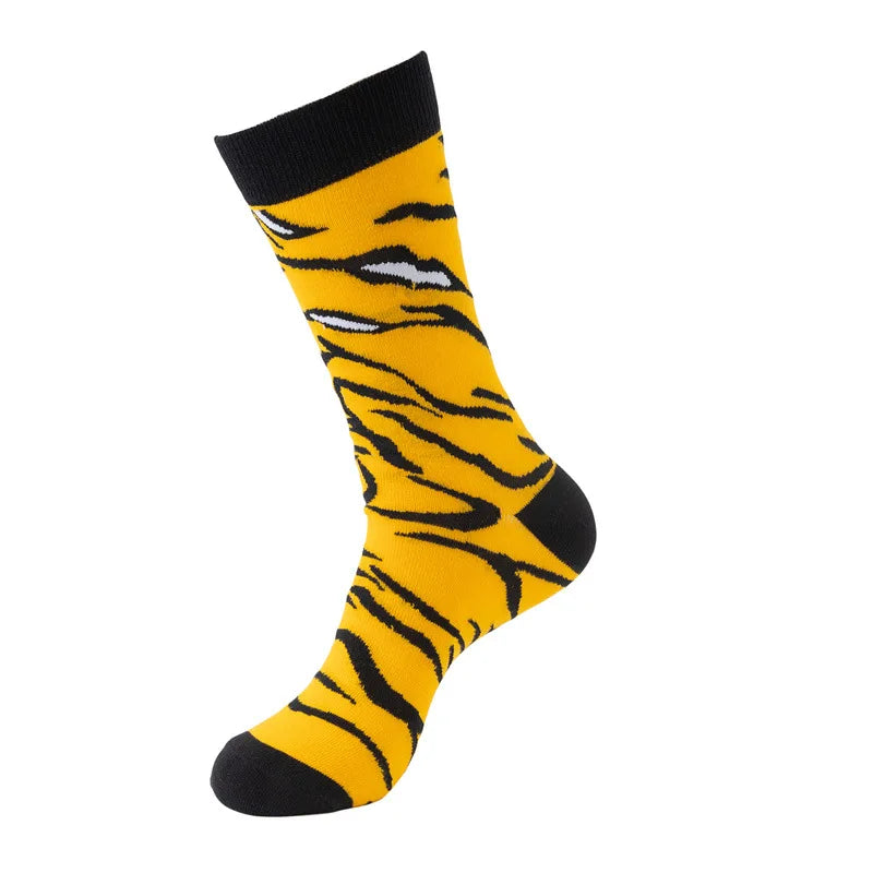A pair of yellow and black tiger print crew socks