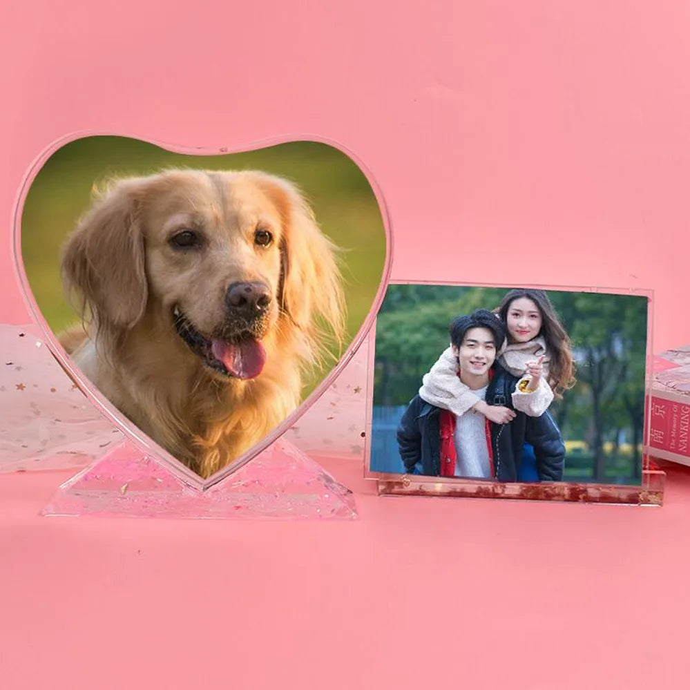 A heart-shaped silicone mold featuring a golden retriever's face and a photo of a couple.