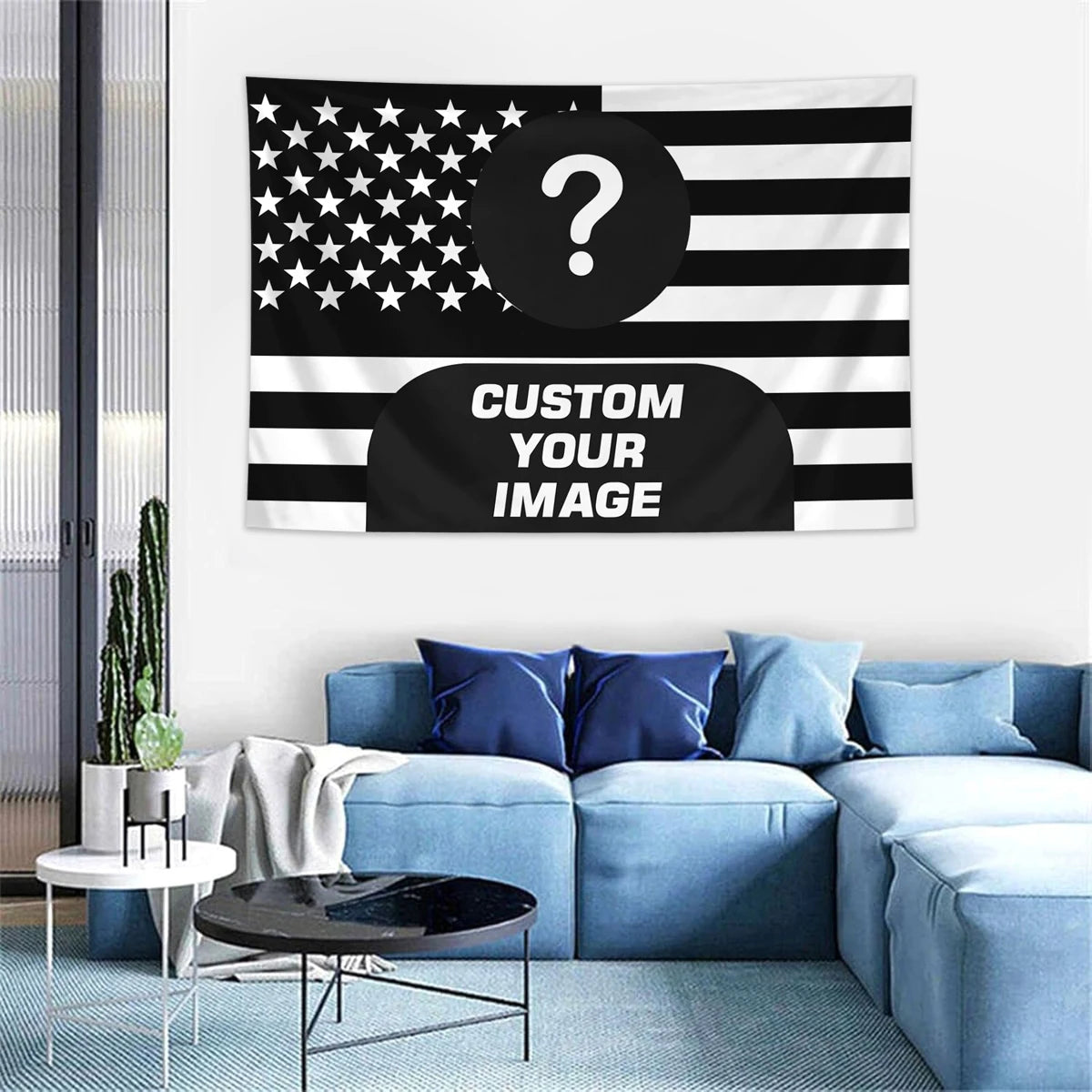 A blue sofa with pillows and a custom photo American flag tapestry featuring stars and stripes.