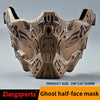 A tan tactical silicone half-face mask with black tribal patterns shown from the front.