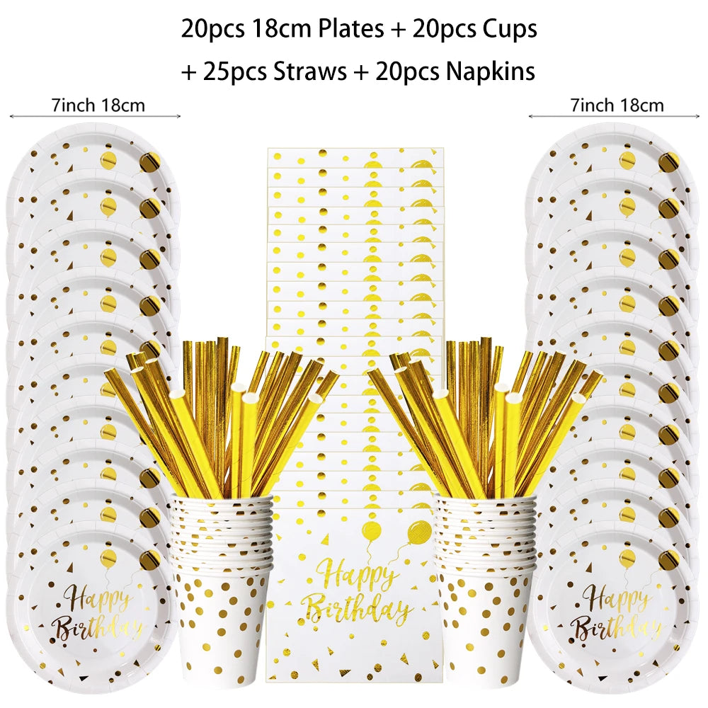 Un juego de vajilla desechable para fiestas de lunares dorados, incluyendo platos, vasos, pajitas y servilletas.