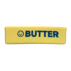 Jouet anti-stress rectangulaire jaune avec le mot BUTTER et un visage souriant imprimés en bleu.