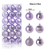 A box containing 36 iridescent purple and silver Christmas tree ornament balls.