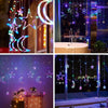 String lights featuring stars and moons illuminate a window with a city skyline view.