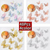 A collection of 48 decorative 3D butterfly wall stickers in various colors and finishes displayed on a white background.