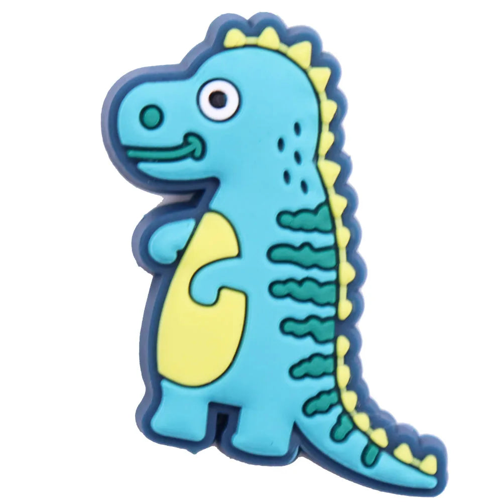 A light blue cartoon dinosaur charm with yellow accents and a spiky outline.