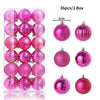 A box containing 36 pink and magenta glitter Christmas tree ornament balls.