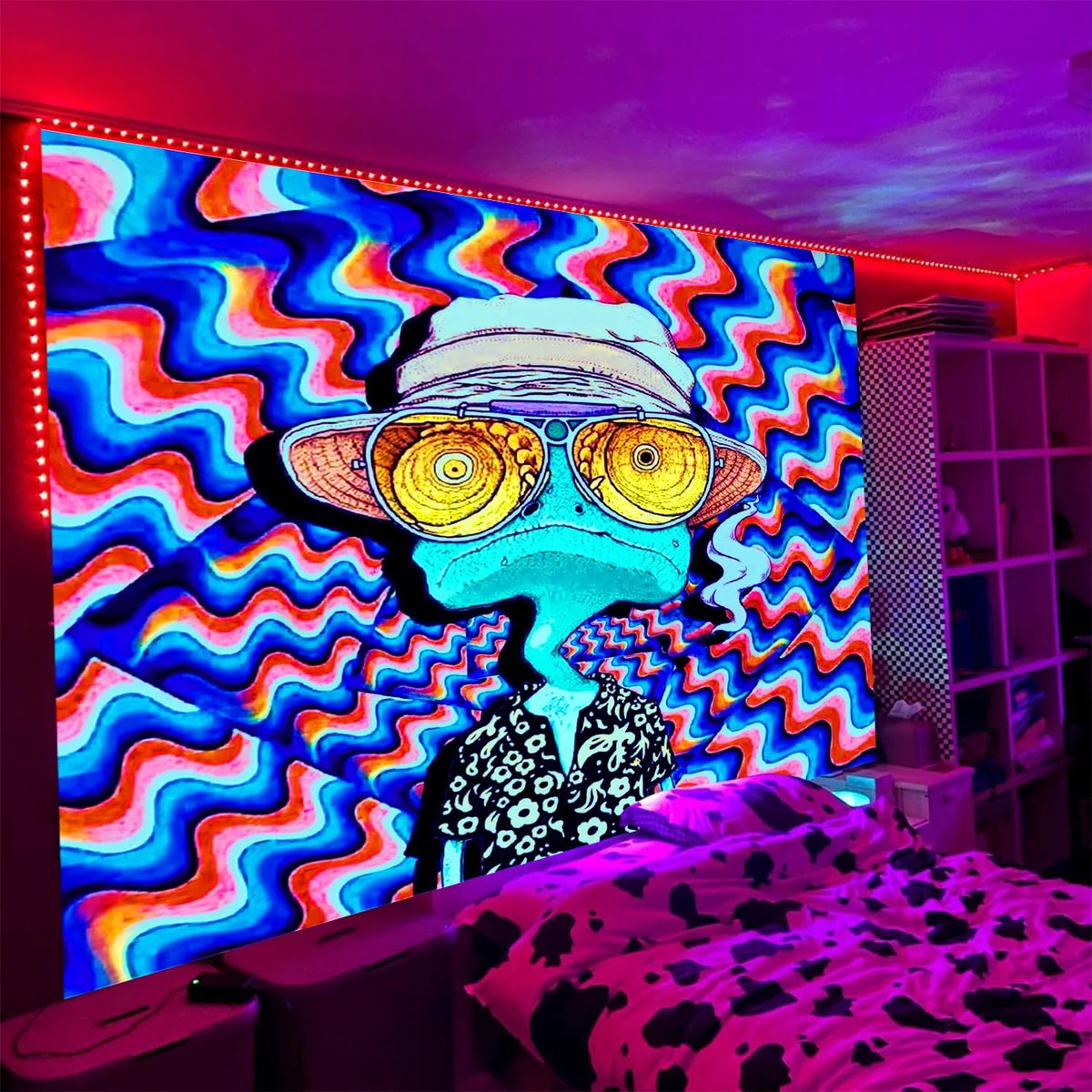 Vibrant tapestry wall art featuring a psychedelic blue and purple character design illuminated by neon lights.