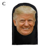A realistic mask shaped like Donald Trump, featuring his face in a black mesh material.