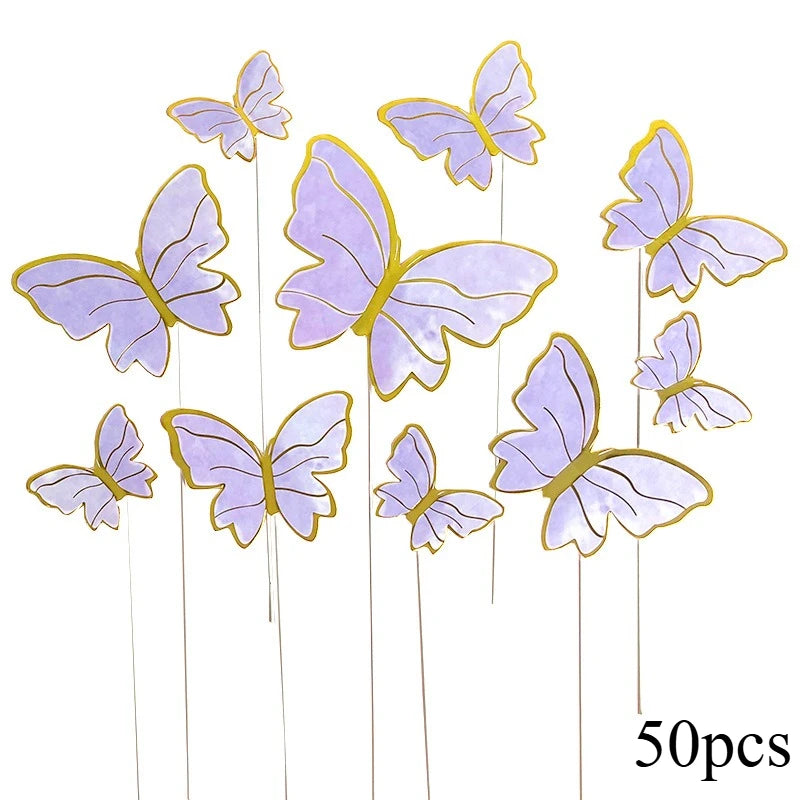 A collection of 50 paper butterfly cake toppers in shades of lavender and purple.