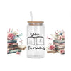 A glass jar filled with clear liquid and a straw, featuring text that reads Shhh I'm reading surrounded by floral elements an
