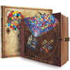 A handmade photo scrapbook album with a cover featuring colorful balloons and an adventure theme.