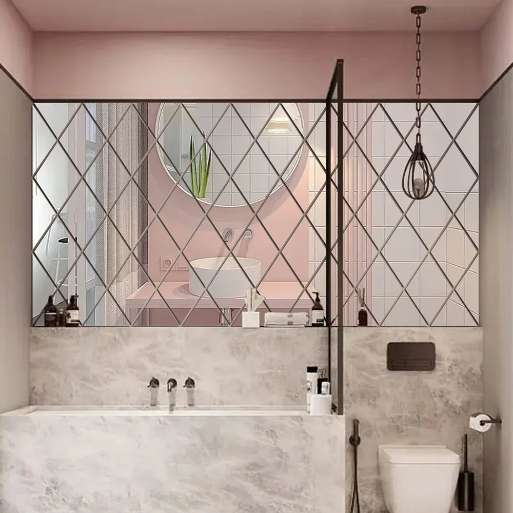 A modern bathroom featuring a vanity with a sink and mirror framed by diamond-patterned glass panels.