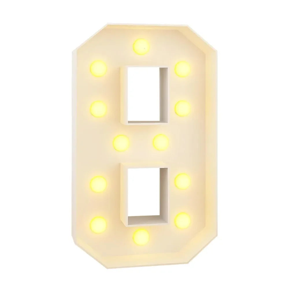 A light-up number balloon decoration shaped like the number 8 with illuminated dots.