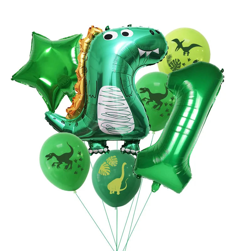 A set of green and gold dinosaur-themed party balloons and banner for a dinosaur party.