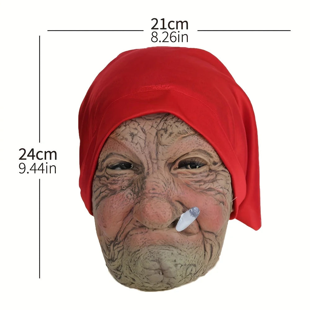 A realistic latex horror mask of an elderly woman with wrinkled skin and a red head covering.