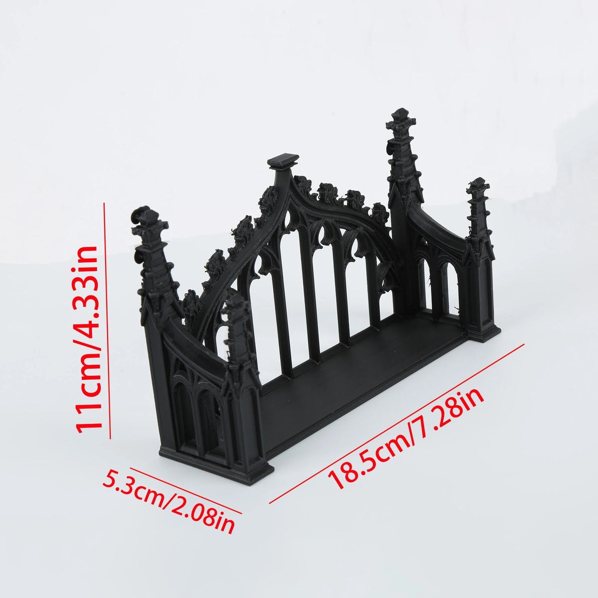 Black ornate Gothic wall shelf featuring intricate carvings and a decorative railing design.