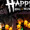 A Halloween decor image featuring glowing pillar candles and skeletal figures against a dark background.