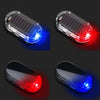 A solar-powered simulated car alarm light shown in four views, displaying blue and red illumination.