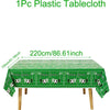 Green plastic tablecloth measuring 220cm long used for parties or events.