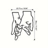 Line drawing of two hands clasped together showing a measurement scale.