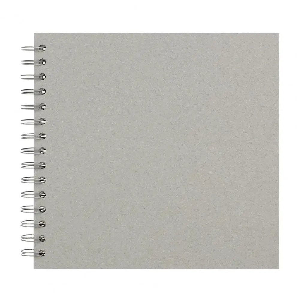 A blank gray spiral-bound notebook or scrapbook album with white pages.