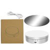 A 360° rotating display stand for jewelry and items shown with a power cord, a mirror, and the main unit.