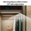 Under cabinet lighting with 120 degree wide-angle sensing illuminating a closet area.