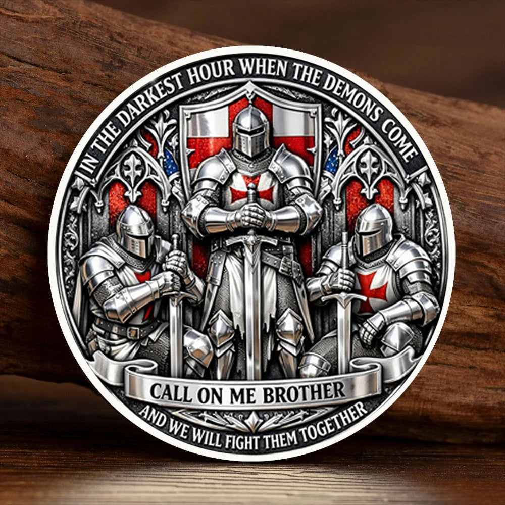 A commemorative coin featuring a silver-plated knight in armor surrounded by demons and text about fighting together.
