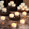 A collection of natural beeswax tealight candles in various sizes and colors arranged on a wooden surface.
