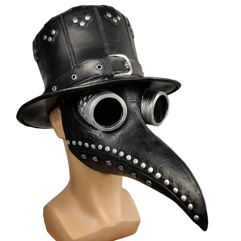 A black plague doctor mask made of natural latex is displayed on a mannequin.