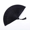 Black traditional Chinese folding fan with fine pleats.