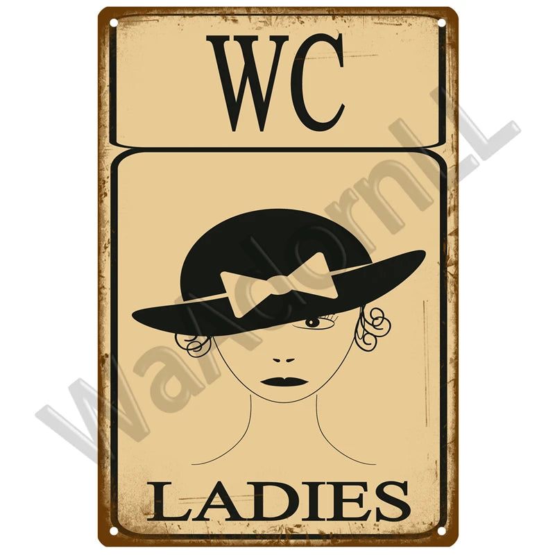 Vintage metal sign featuring the initials WC and a silhouette of a woman labeled LADIES