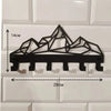 Black industrial iron wall mount key holder featuring a geometric mountain design and seven hooks