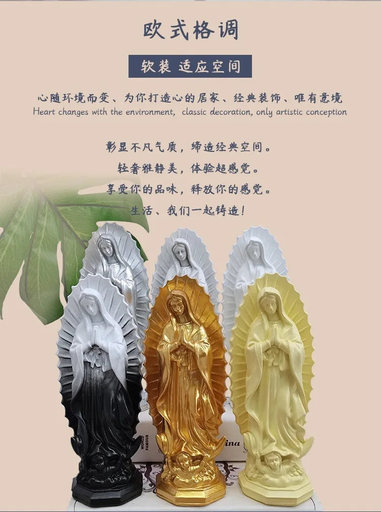 A collection of resin statues depicting the Virgin Mary in various poses and styles, including gold, silver, and white finish
