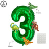 Green foil balloon shaped like the number 3 with attached dinosaur decorations