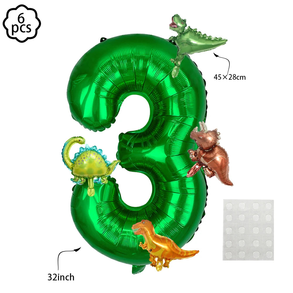 Green foil balloon shaped like the number 3 with attached dinosaur decorations