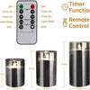A set of LED flickering glass pillar candles and a remote control timer function shown with various sizes.