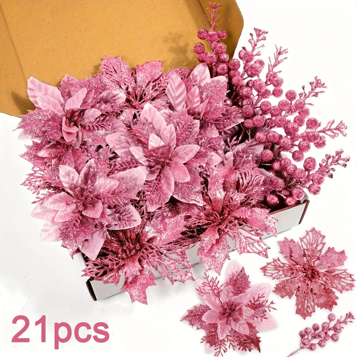 A bouquet of pink artificial berry and flower stems displayed in a box.