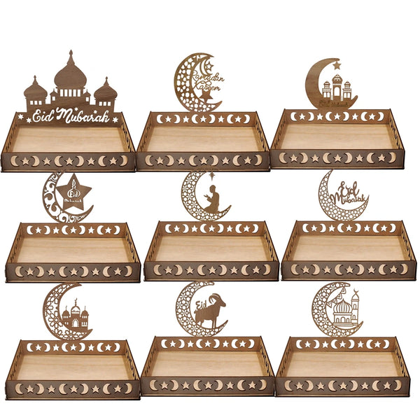 Collection of wooden Eid Mubarak serving trays and decorative plates for Ramadan and Eid celebrations