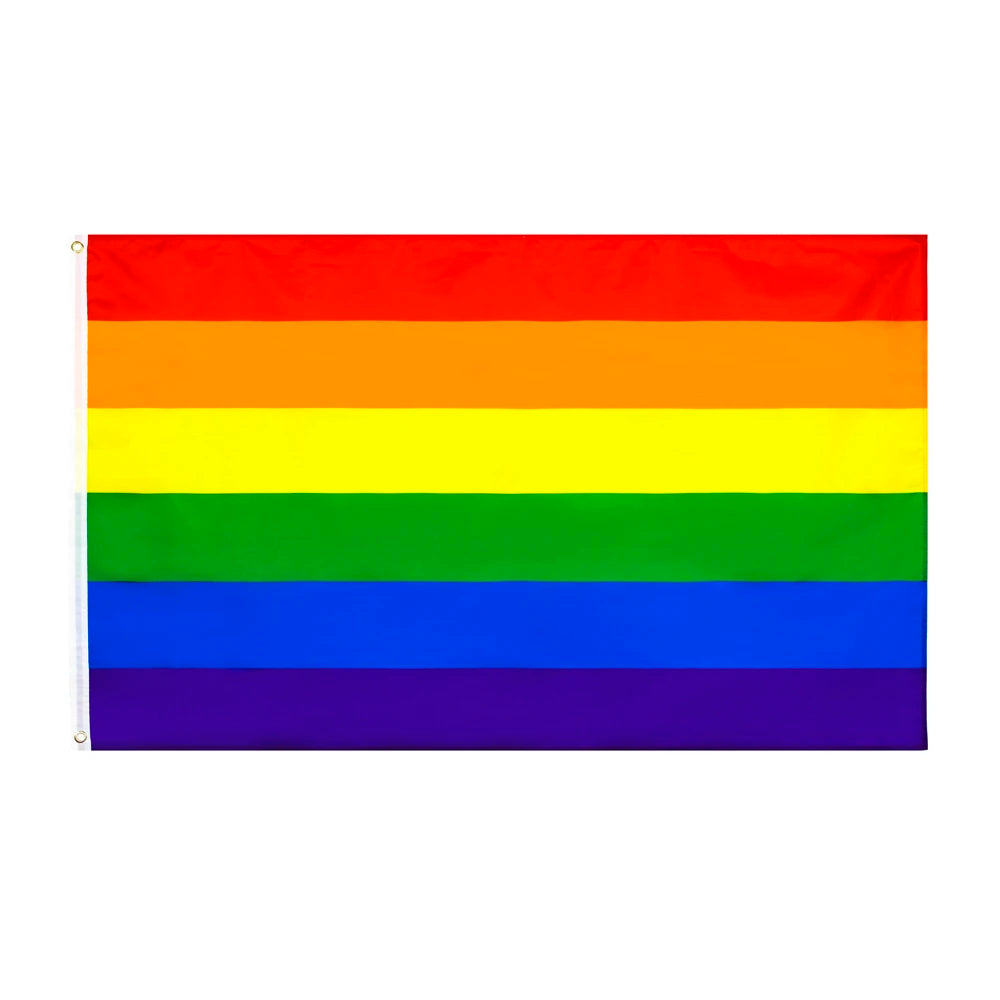 Bannière en tissu horizontal affichant les six couleurs du drapeau de la fierté : rouge, orange, jaune, vert, bleu et violet.