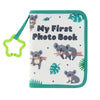 A teal silicone photo book featuring a pattern of cute gray koala illustrations and the text My First Photo Book.