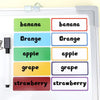 A set of reusable magnetic dry erase labels featuring various fruits like banana, orange, apple, grape, and strawberry.