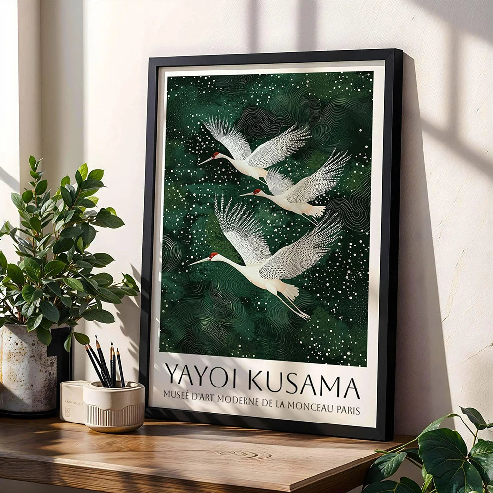 A framed canvas print featuring a white crane in flight against a dark green, starry background.