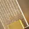 Modern bubble crystal LED wall sconces with a golden accent light