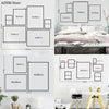 A set of various sized square and rectangular canvas posters displayed against a white wall.