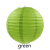 A round, lime green decorative paper lantern.