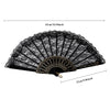 Black and white vintage lace folding fan with a decorative gold trim