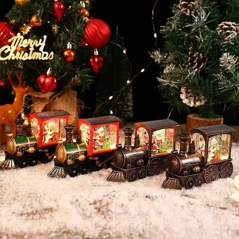 A collection of decorative Christmas train music boxes with LED lights and crystal balls resting on a snowy surface.
