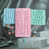 A silicone mold set featuring various letters and numbers in pastel colors for baking